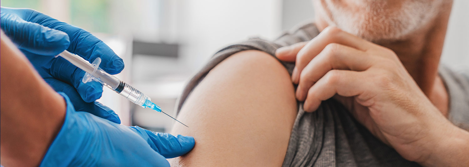 Man receiving vaccination