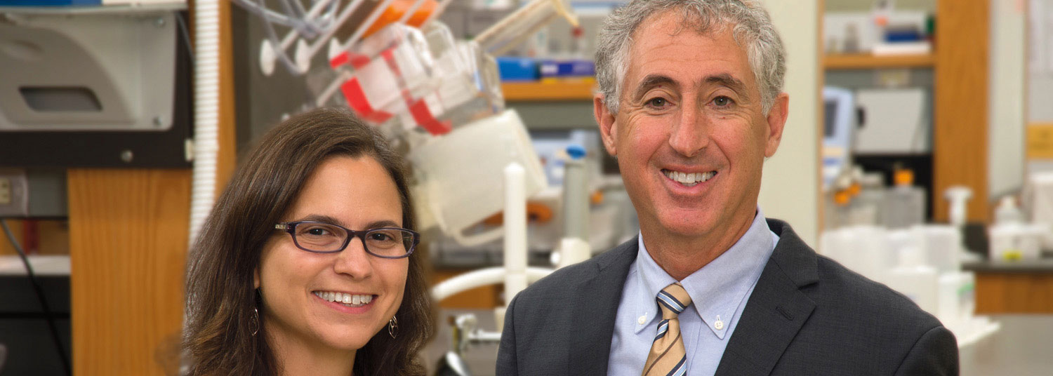 A photo of two endocrinology faculty members smiling