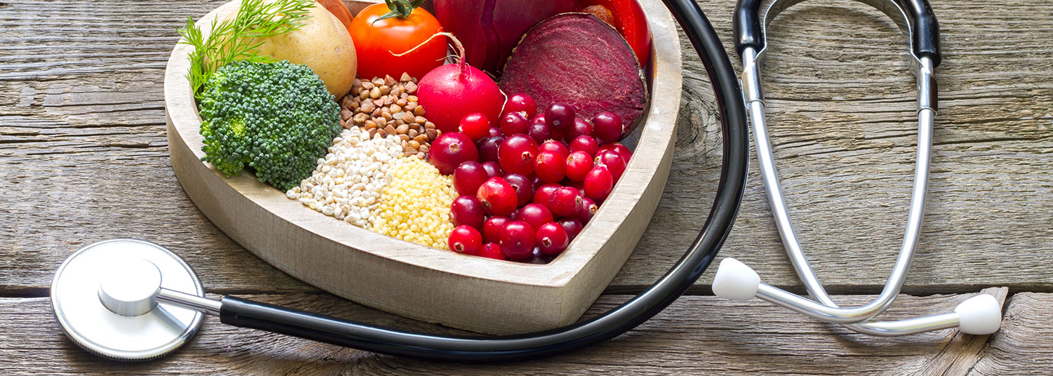 A heart shaped dish with a stethoscope