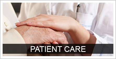 Patient care over a provider holding a patient's hand