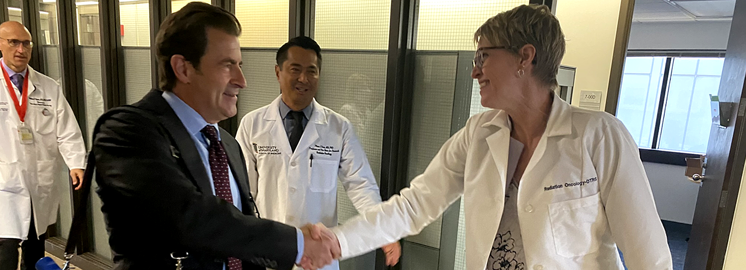 Dean Gladwin and Erika Davies shaking hands