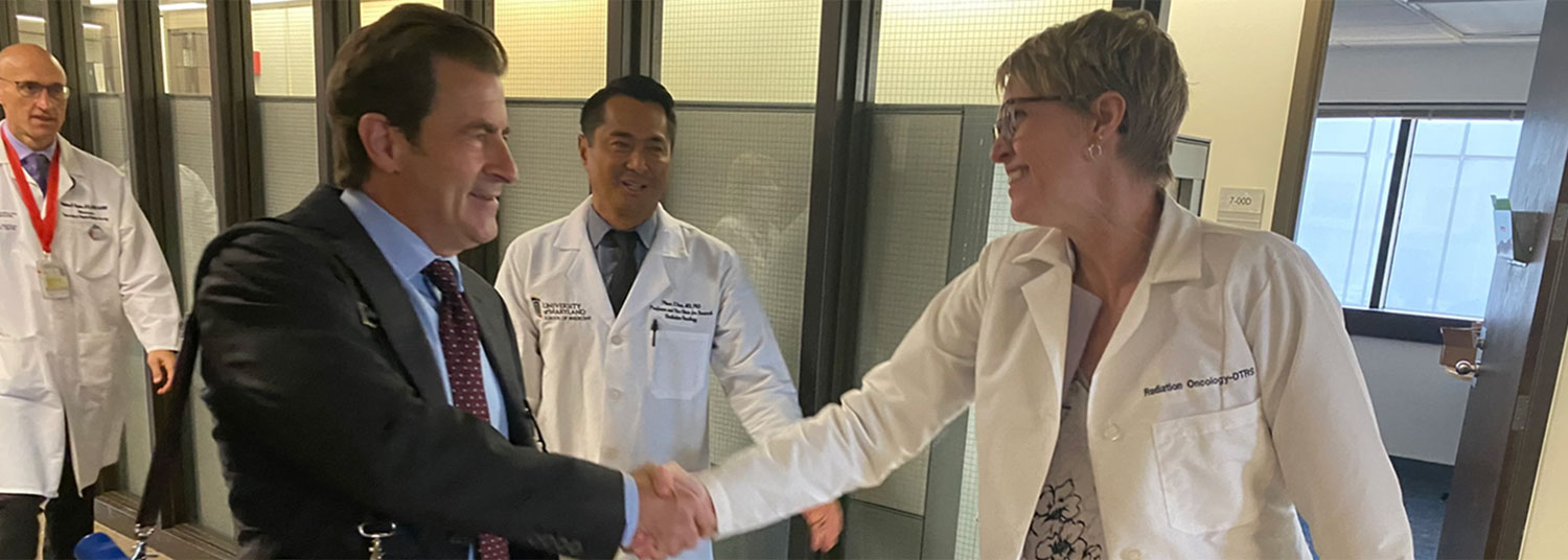 Dean Gladwin and Erika Davies shaking hands