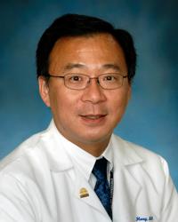 a professional portrait of Dr. John Hong