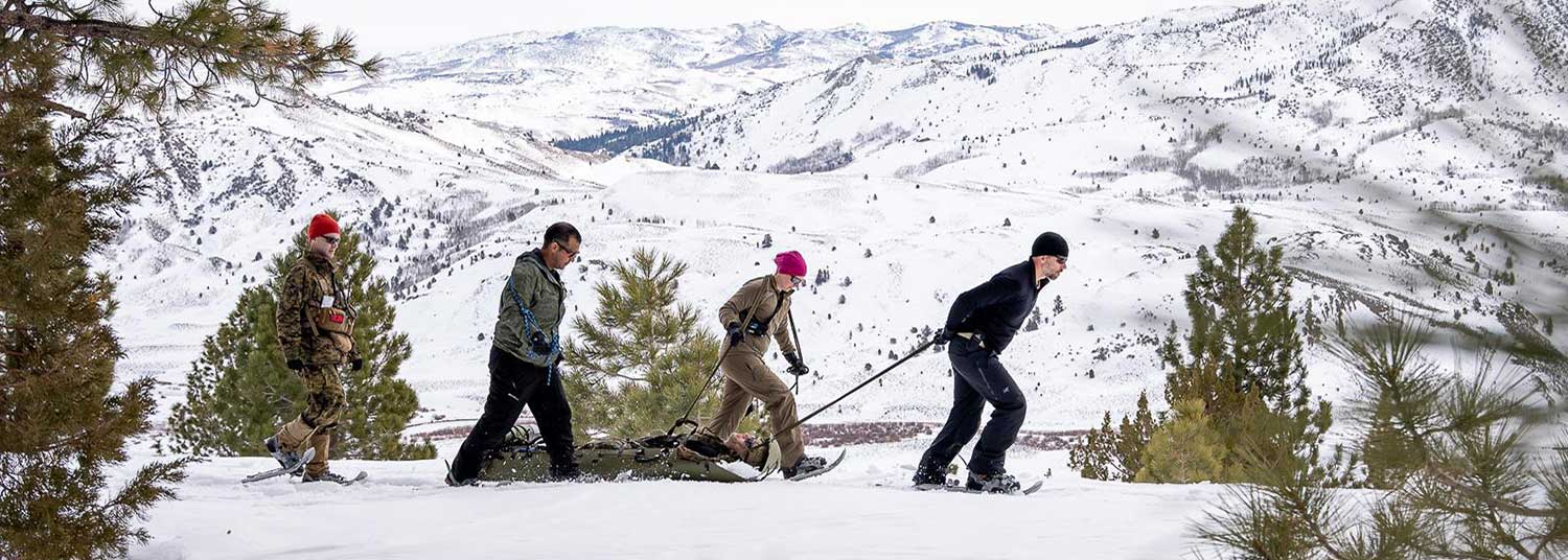 4 People Walking Outside in the Snow