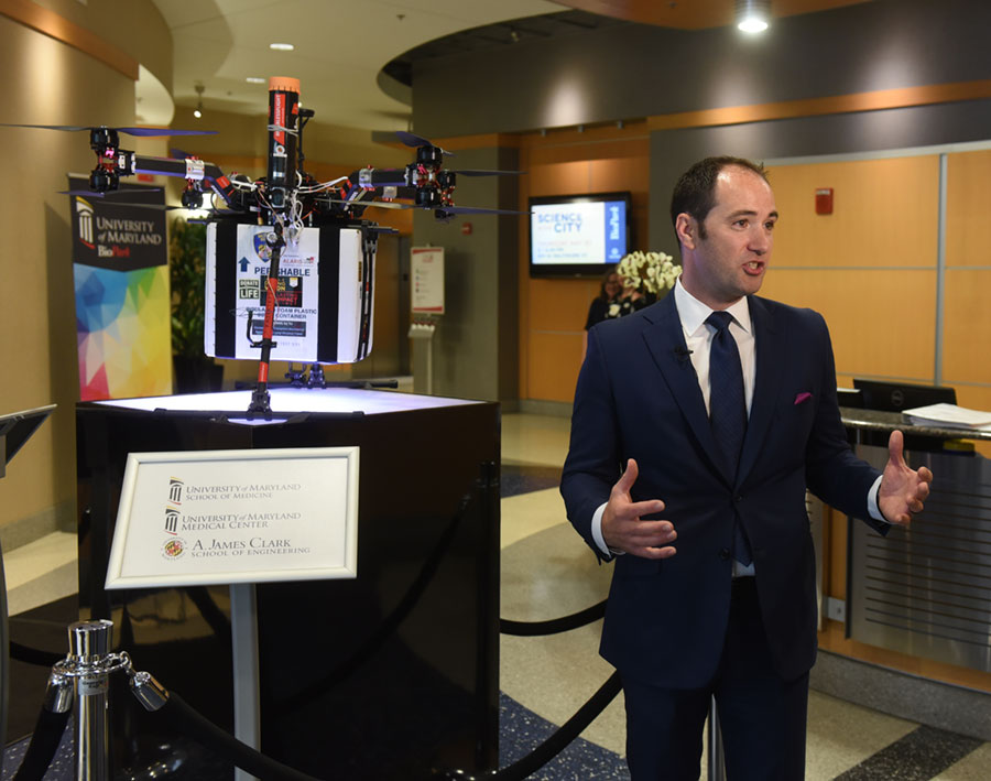 Dr. Joseph Scalea standing next to the drone