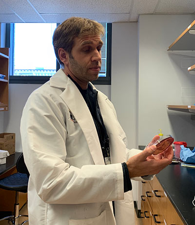 James Doub, MD in his lab