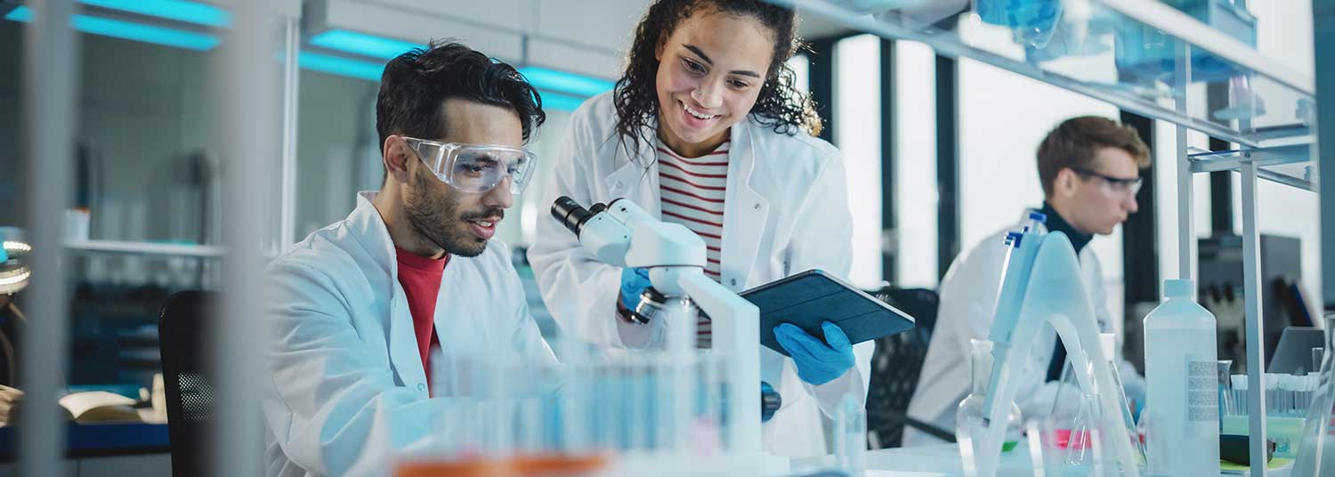 Male and female scientists in lab