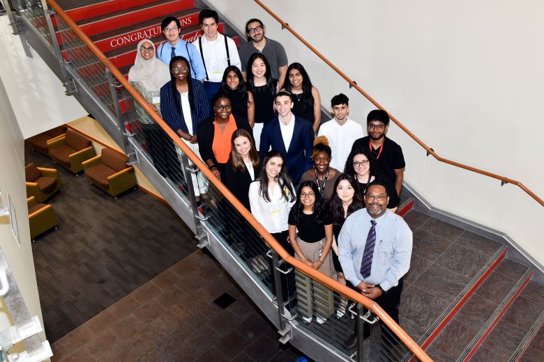 Students at staircase at Forum 2024