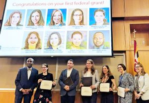 May 2024 funding recognition, left to right: E. Albert Reece, Gloria Reeves for Stephanie Hare, Matthew Frieman for Meagan Deming, Galya Bigman, Rachel Breman, Haley Miles-McLean, and Marey Shriver